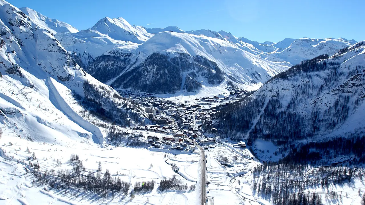 Aerial view of Val d'Isère village and valley in winter