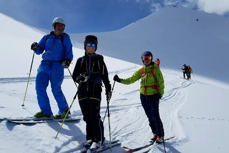 Group of ski tourers smiling during an outing
